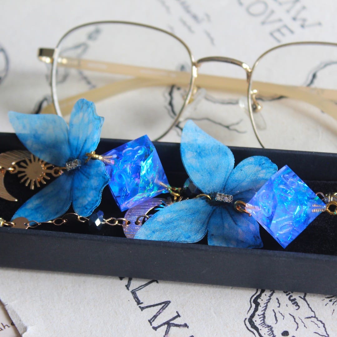 Enchanted Skywing Glasses Chain with Dice