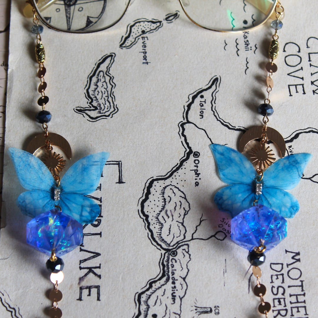 Enchanted Skywing Glasses Chain with Dice