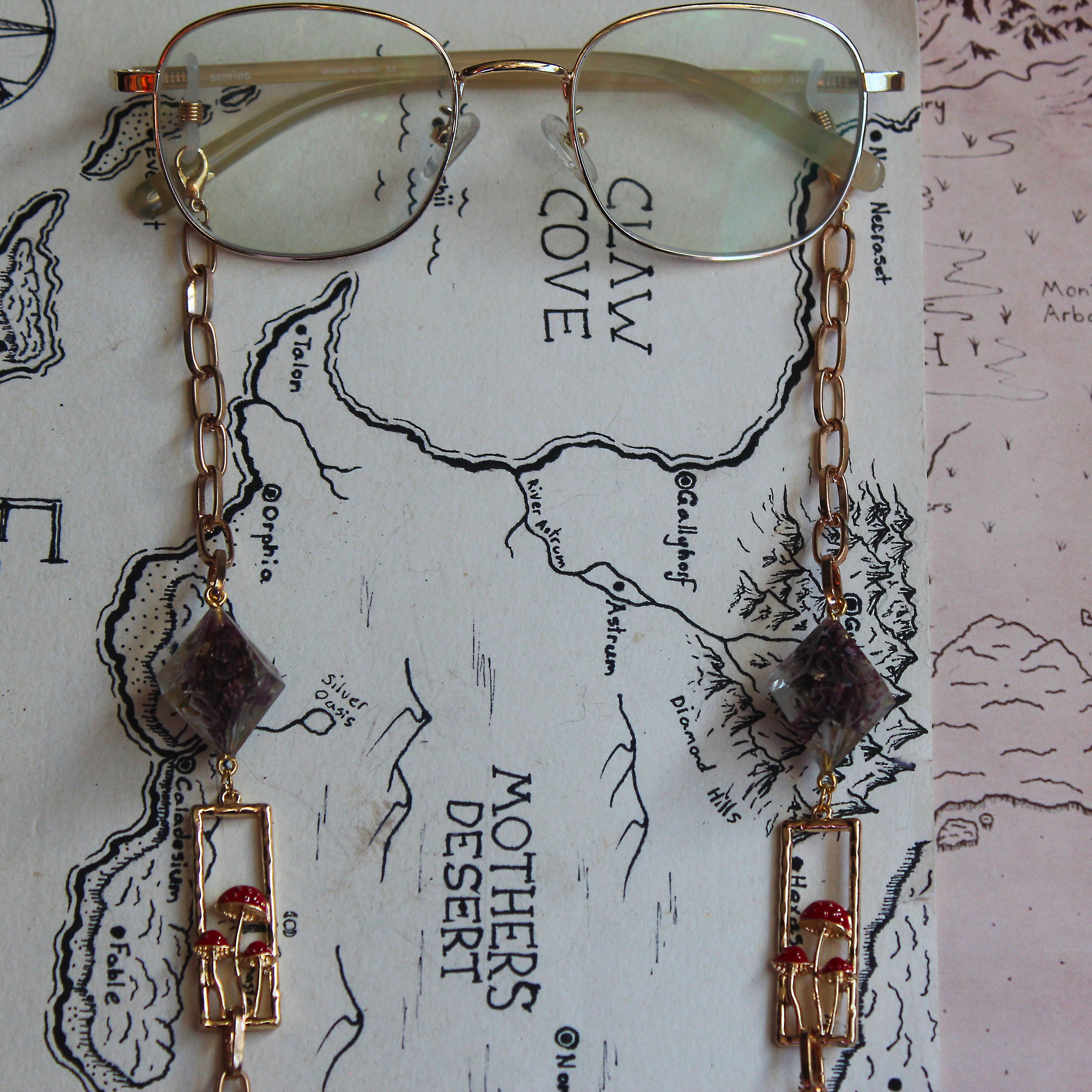 Ruby Red Fungi Friends Glasses Chain with Dice