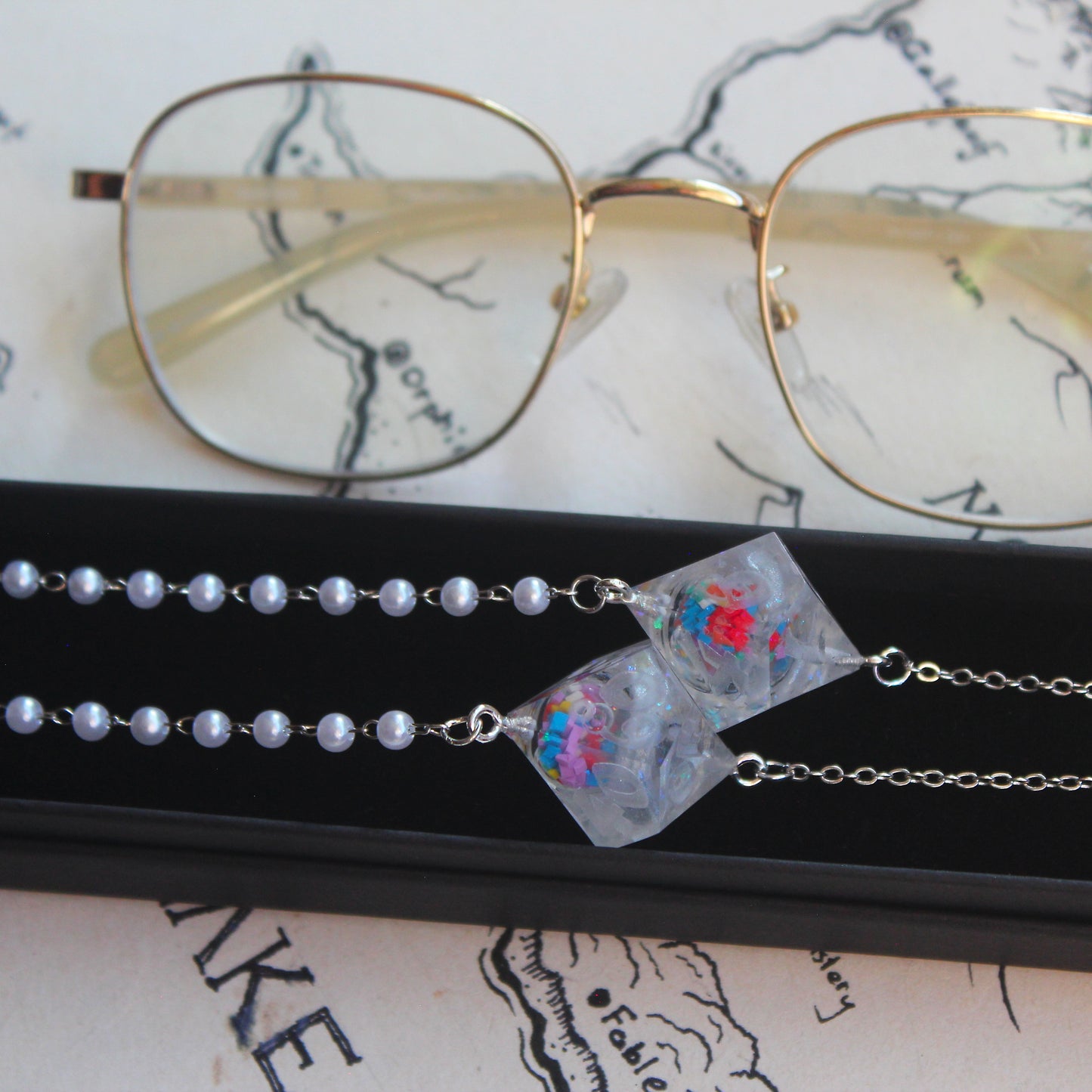 Sprinkles in a Liquid Core Dice Glasses Chain
