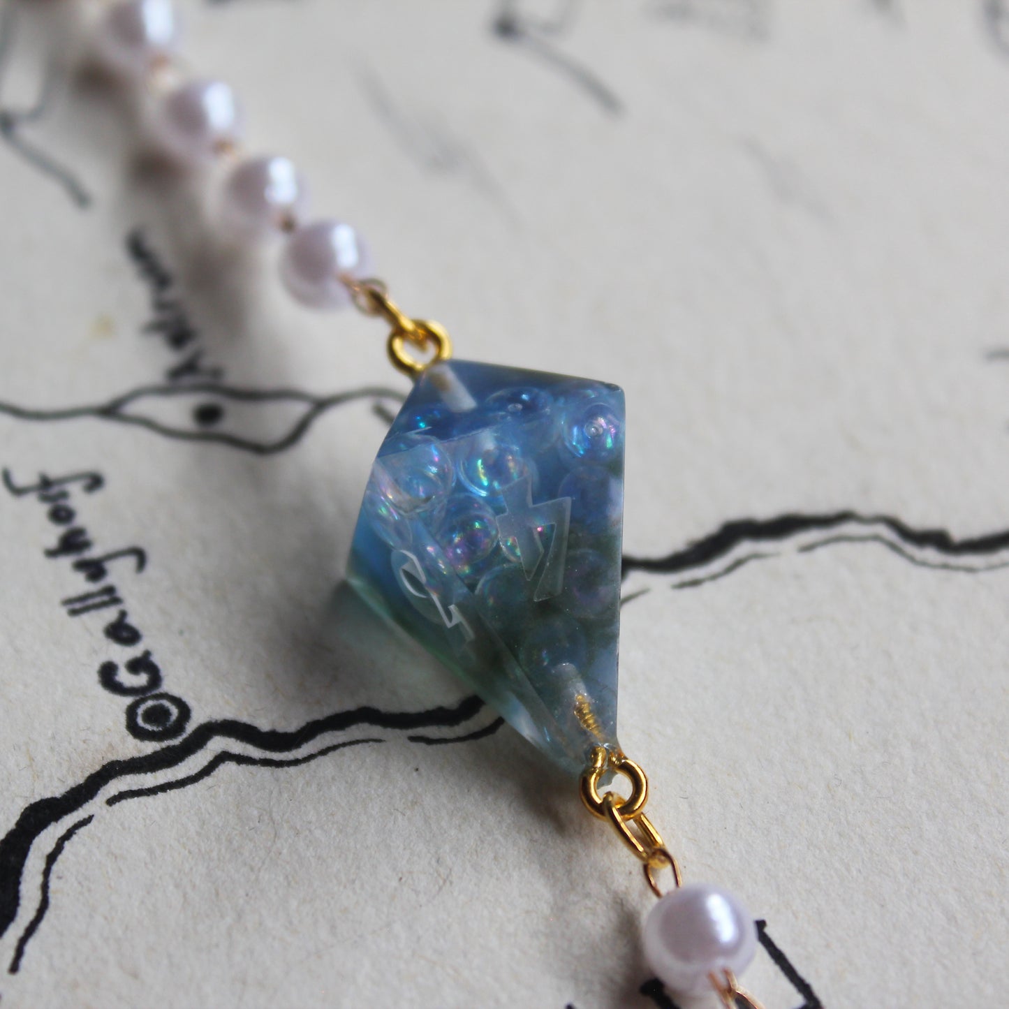 Oceanic Tidal Treasures Glasses Chain with Dice
