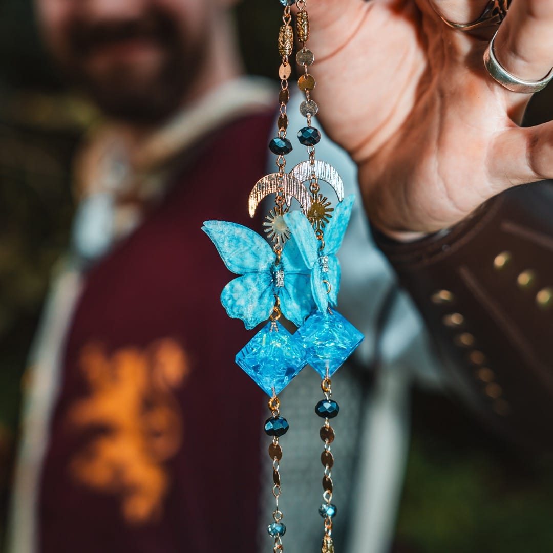 Enchanted Skywing Glasses Chain with Dice