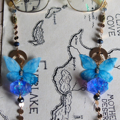 Enchanted Skywing Glasses Chain with Dice