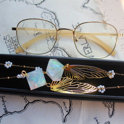 Golden Wings Glasses Chain with Dice