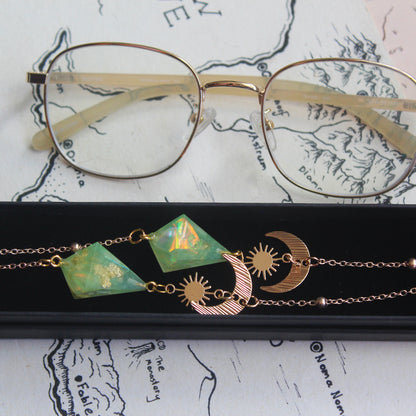 Green Planet with a Sun and Moon Glasses Chain with Dice
