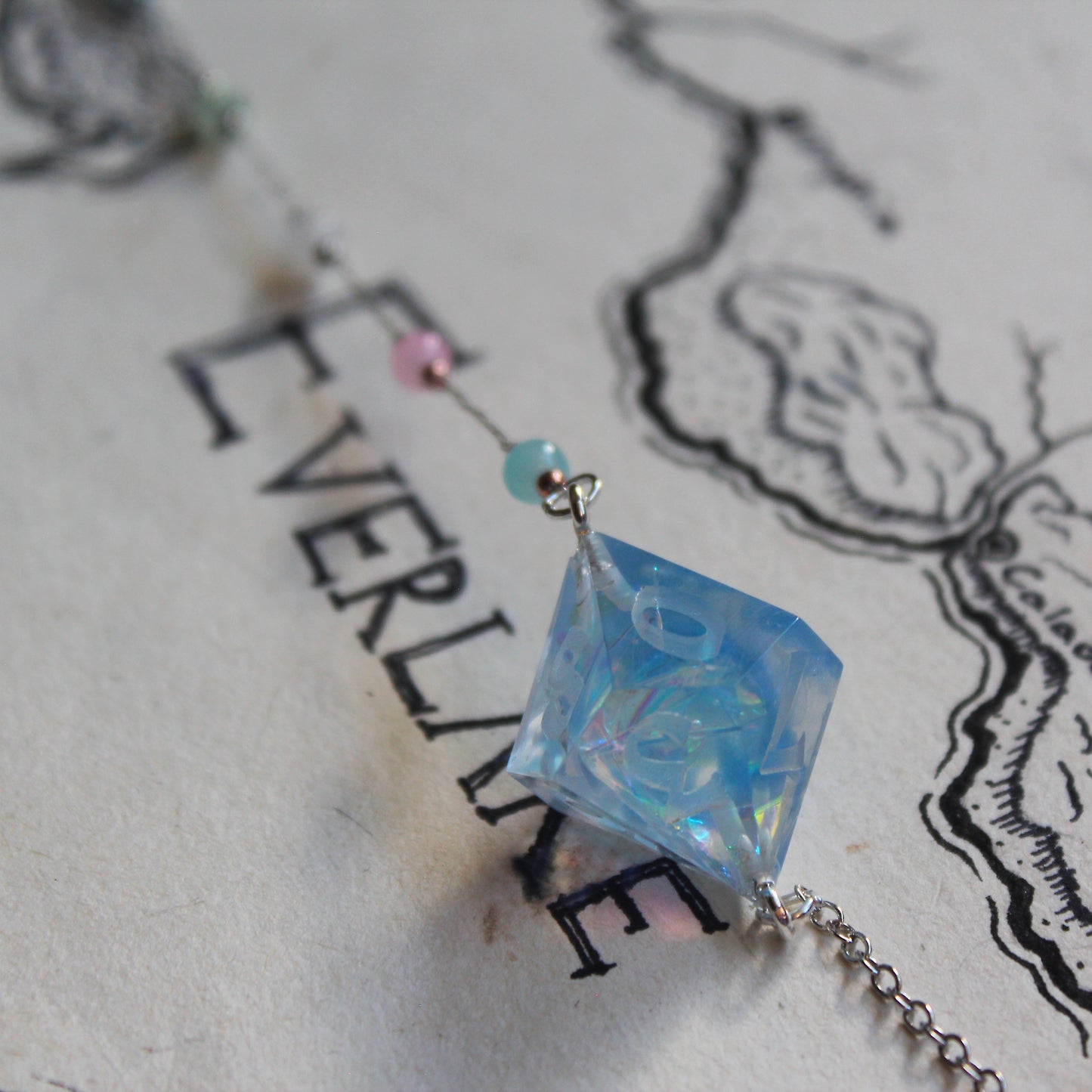Neptune & Moons Glasses Chain with Dice
