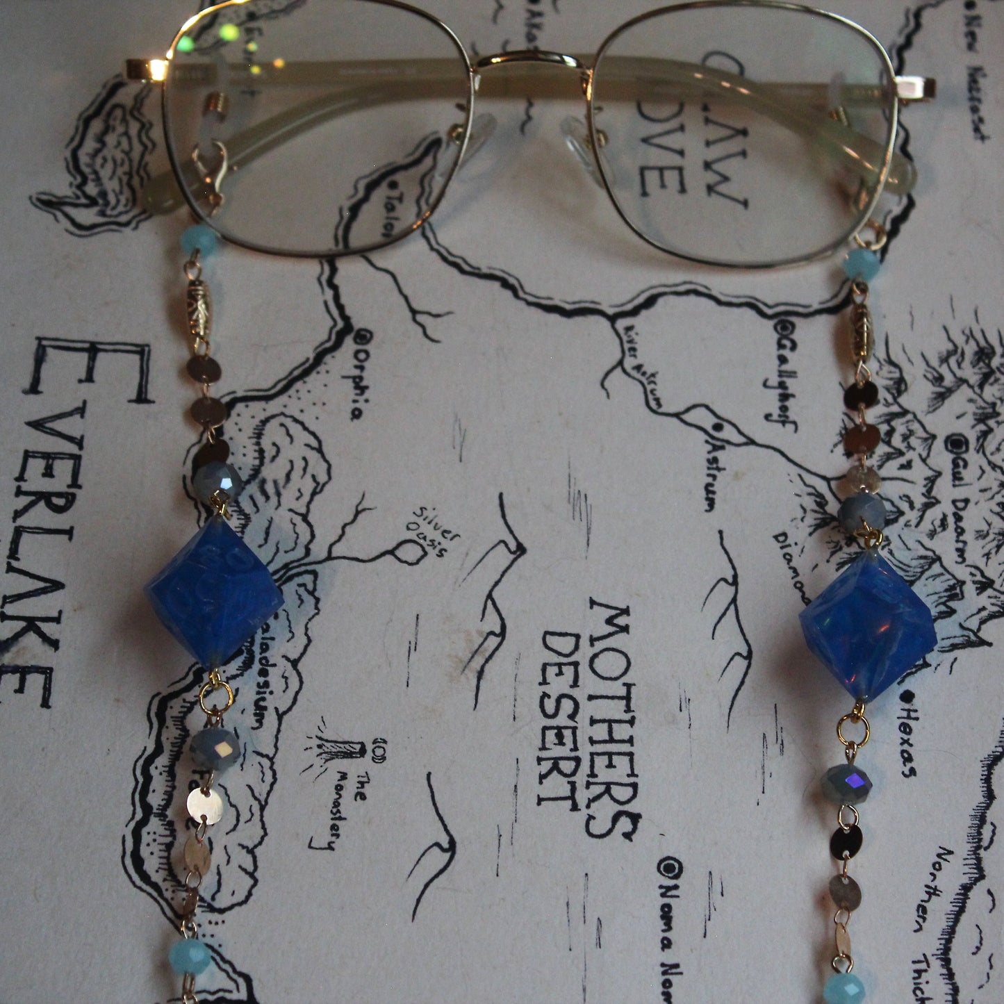 Neptune & Moons Glasses Chain with Dice