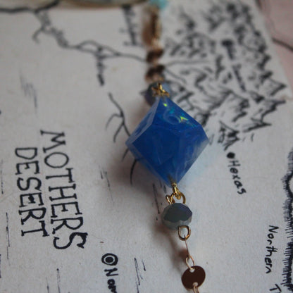 Neptune & Moons Glasses Chain with Dice