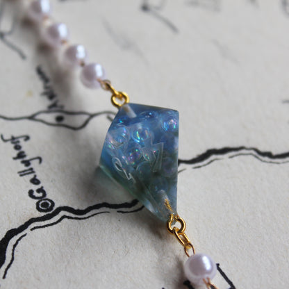 Oceanic Tidal Treasures Glasses Chain with Dice