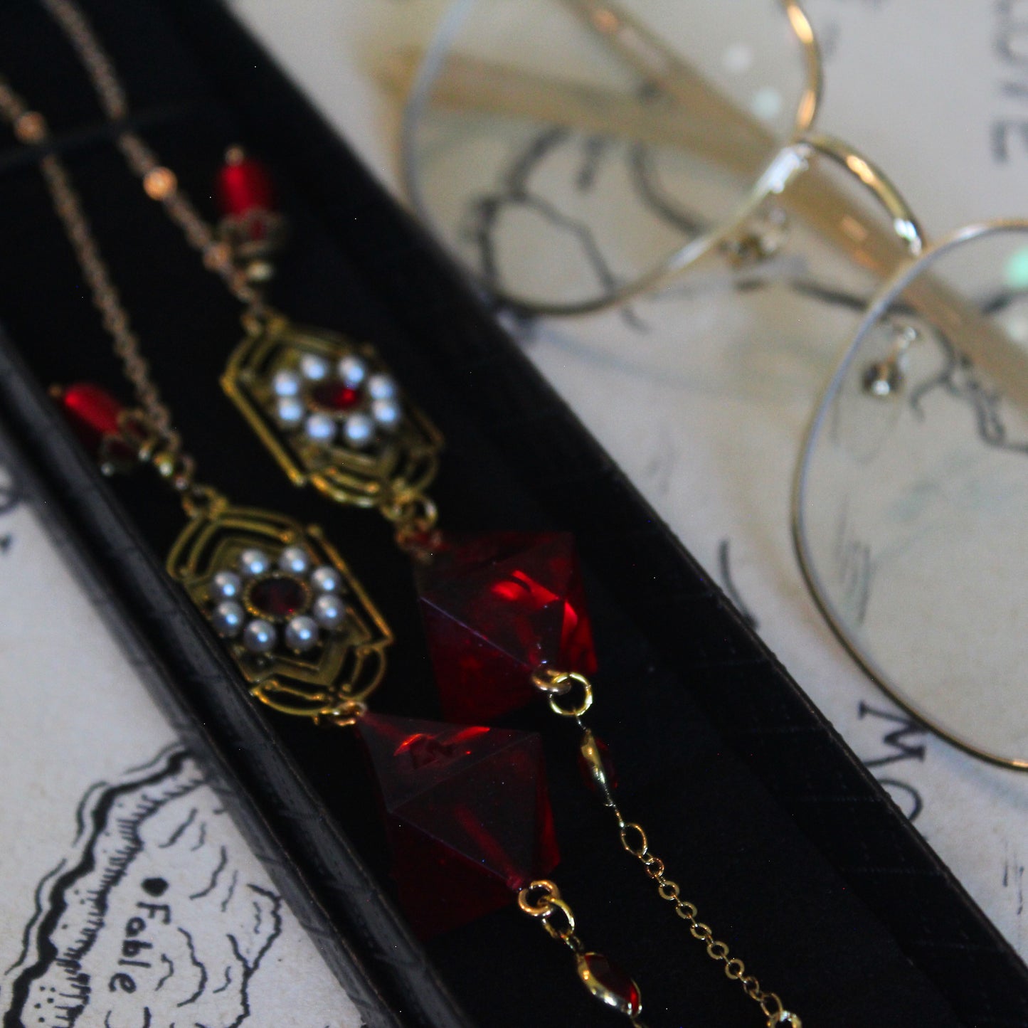 Red Sunflare Glasses Chain with Dice