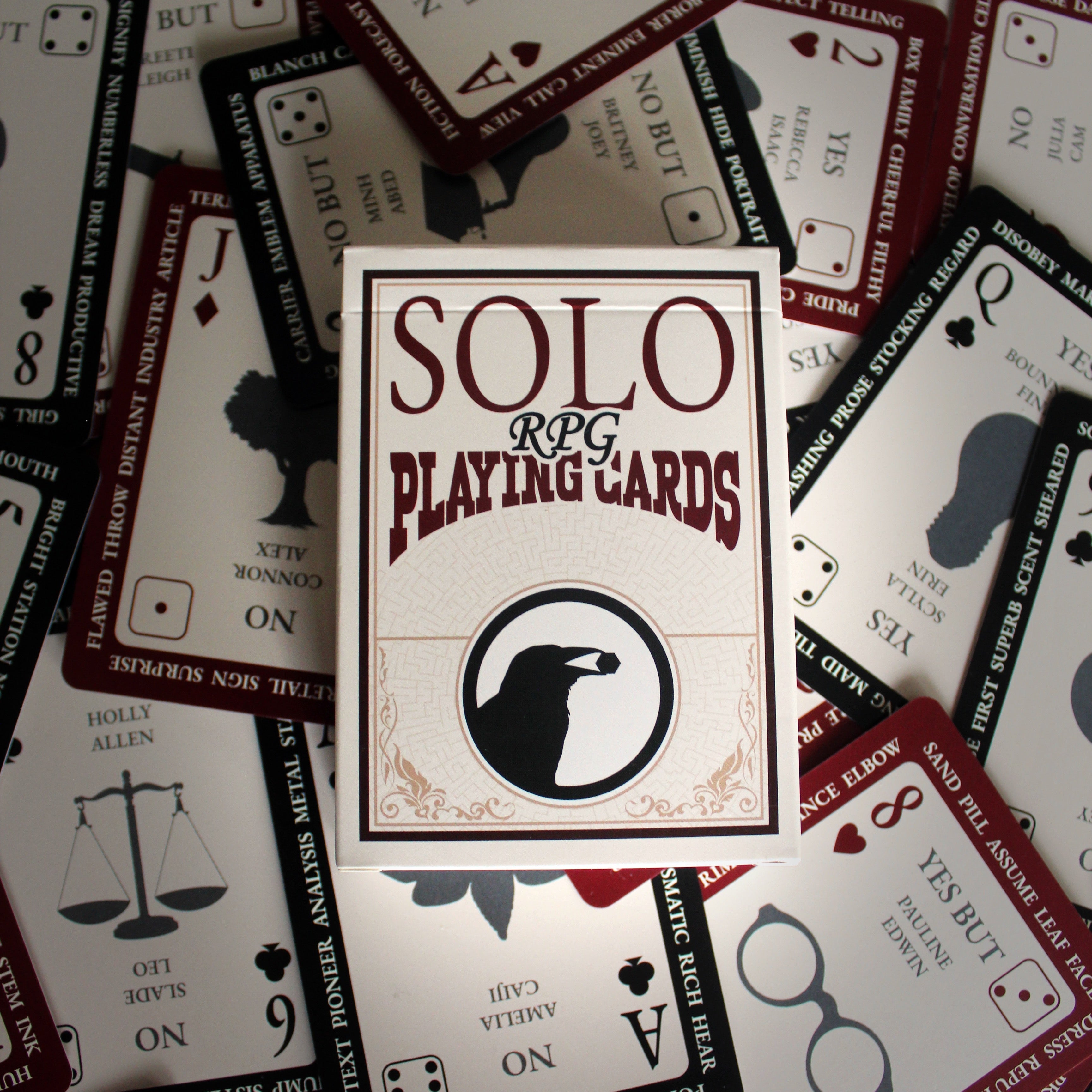 Stack of Solo RPG Playing Cards with visible card designs and text.