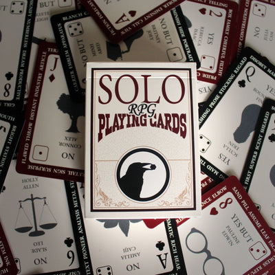 Stack of Solo RPG Playing Cards with visible card designs and text.