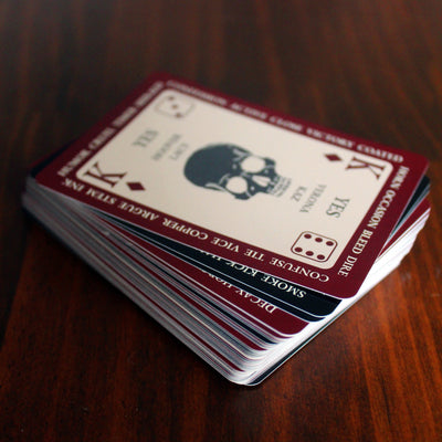 Stack of playing cards on a wooden surface