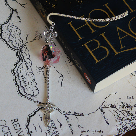 Aabria Iyengar in Pink Metal Bookmark with Dice