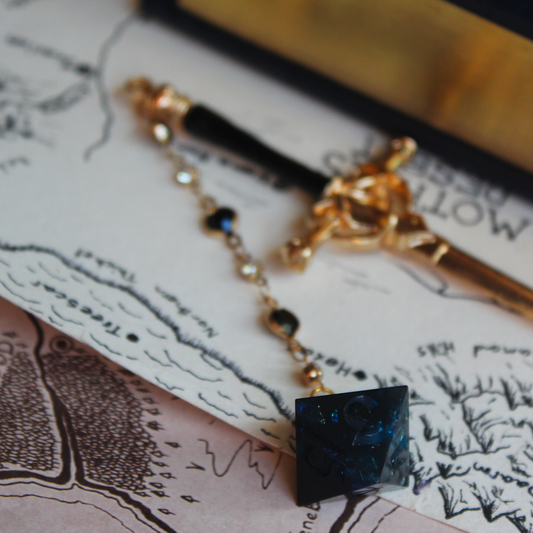 Dangerous Beast from the Depths Hair Sword with Dice