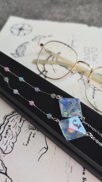 Neptune & Moons Glasses Chain with Dice