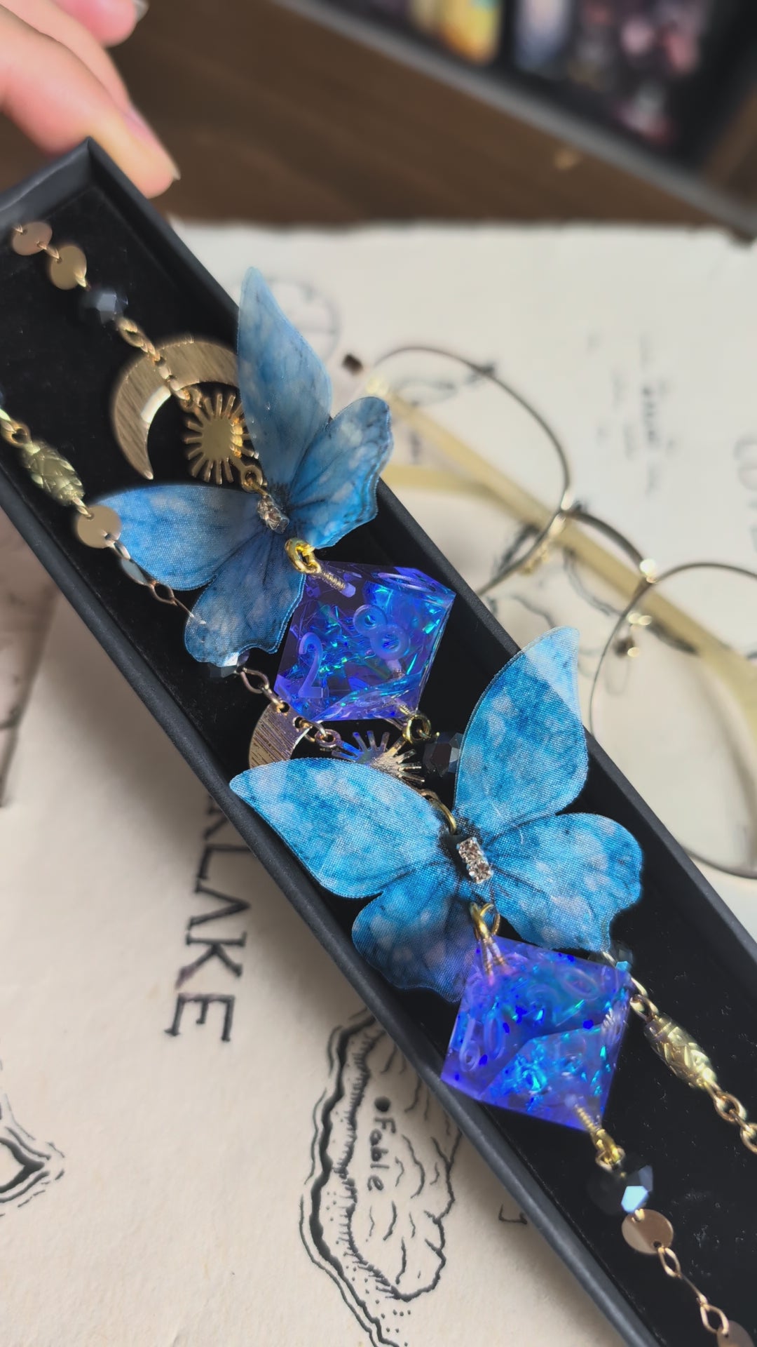 Enchanted Skywing Glasses Chain with Dice