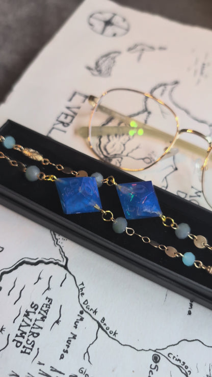 Neptune & Moons Glasses Chain with Dice