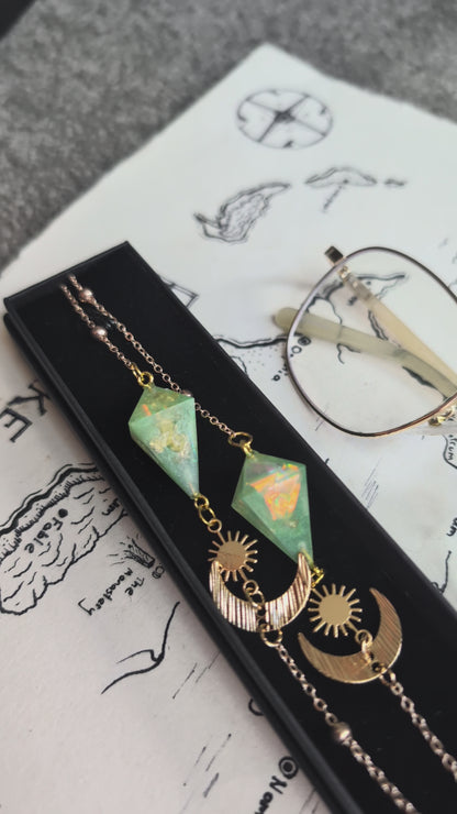 Green Planet with a Sun and Moon Glasses Chain with Dice